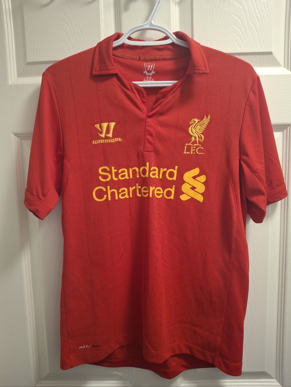 2012-2013  Warrior Liverpool FC Red Standard Chartered Home Jersey. Size S